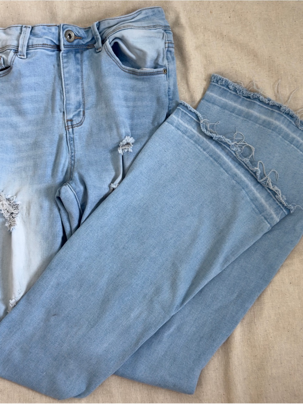 Light Blue Women's High-Rise Flare Jeans with Frayed Hem